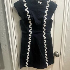 Elegant Black Dress with White Trim